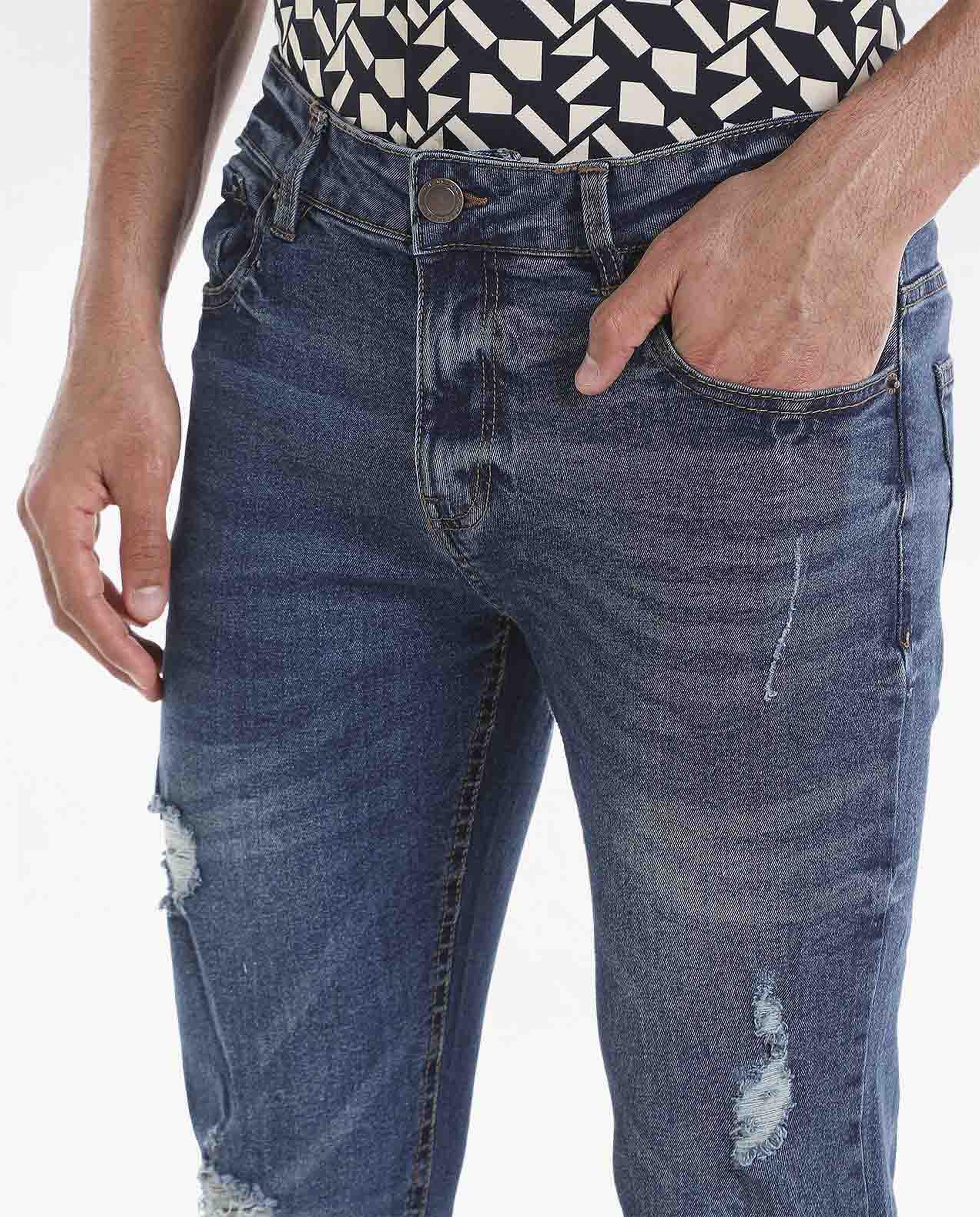 Light Faded Mildly Distressed Mid-Rise Jeans with Button Closure