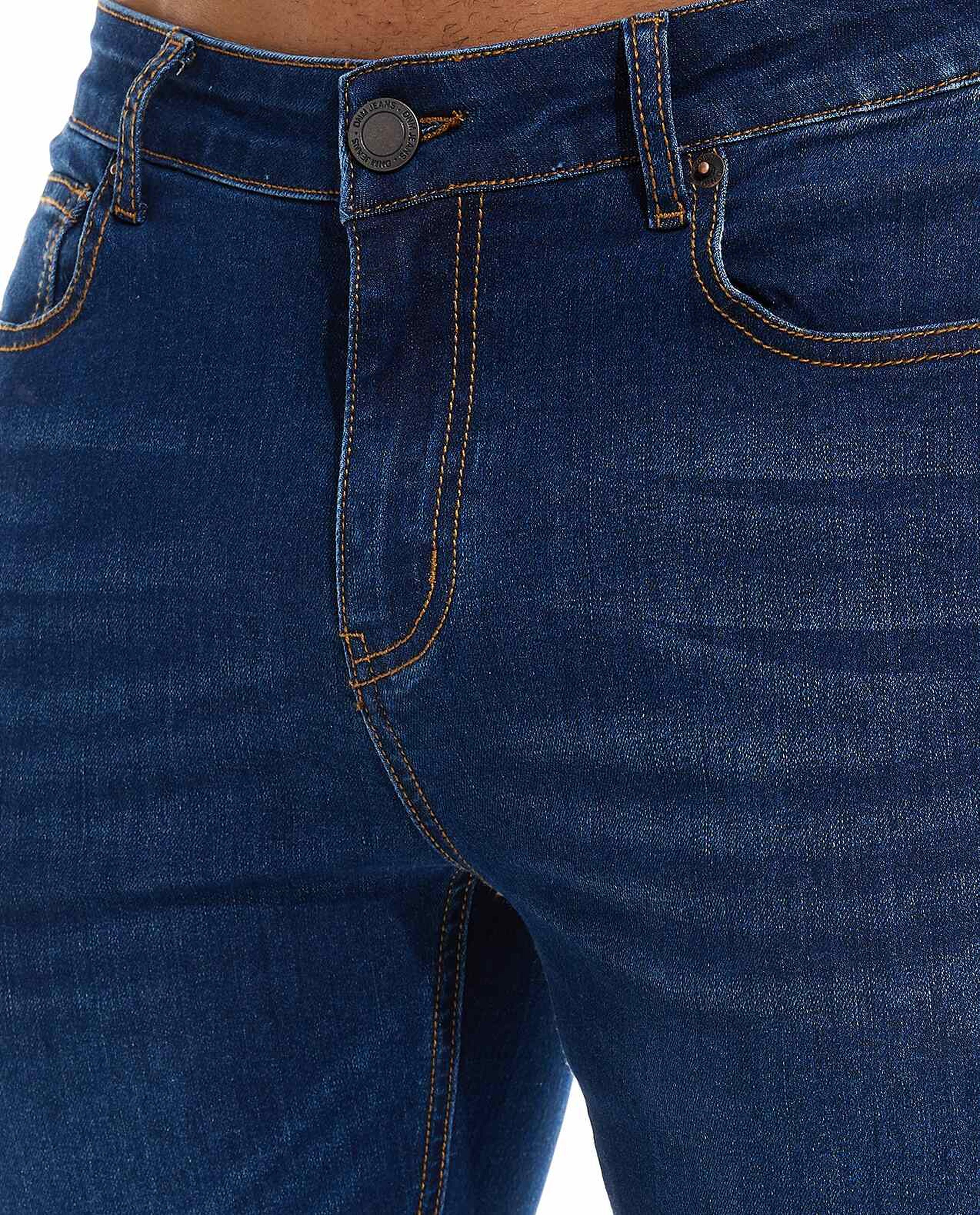 Faded Skinny Jeans with Button Closure