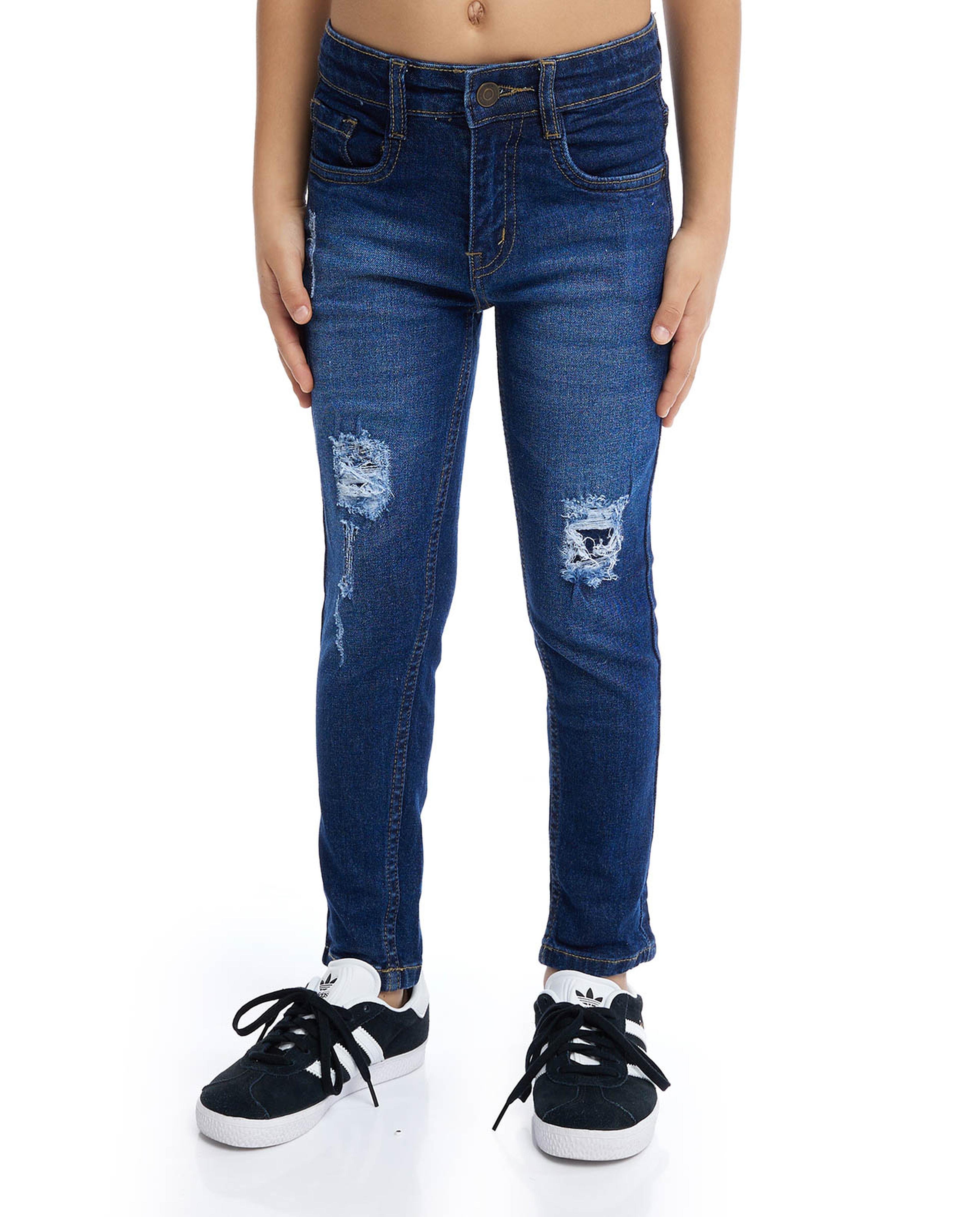 Ripped Slim Fit Jeans with Button Closure