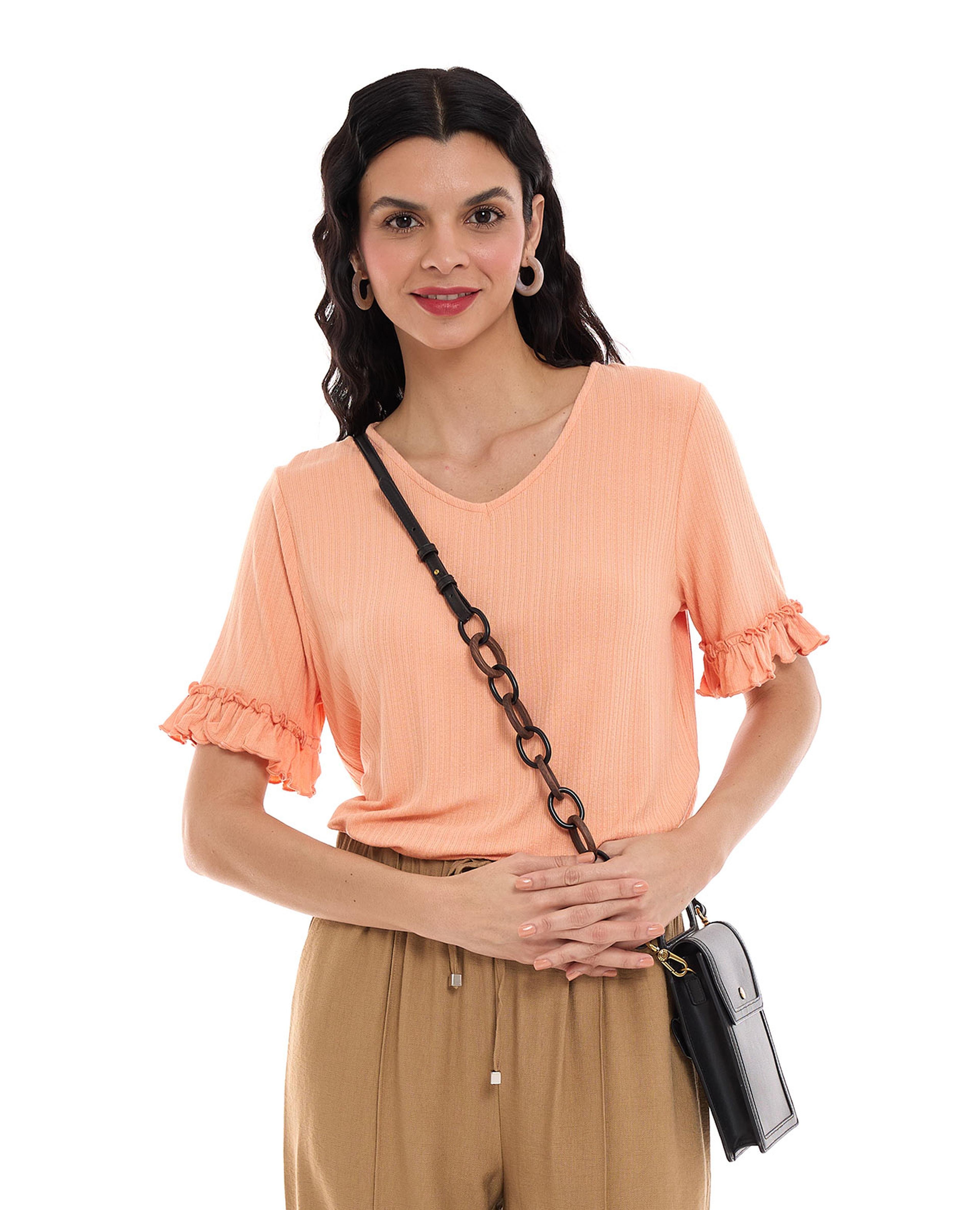 Self Patterned Top with V-Neck and Flutter Sleeves
